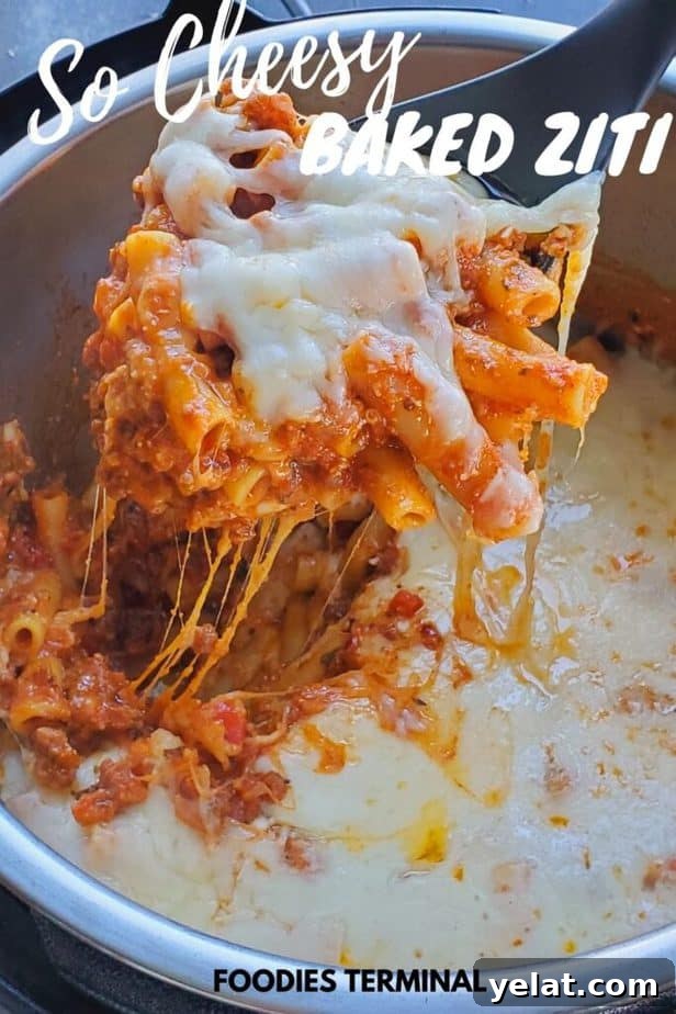 perfect instant pot baked ziti being lifted with a ladle from the instant pot