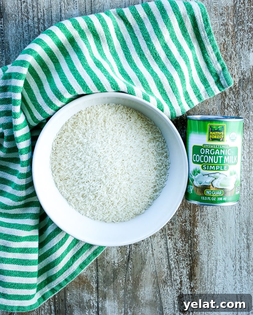 jasmine rice and a can of coconut milk with a green and white striped towel