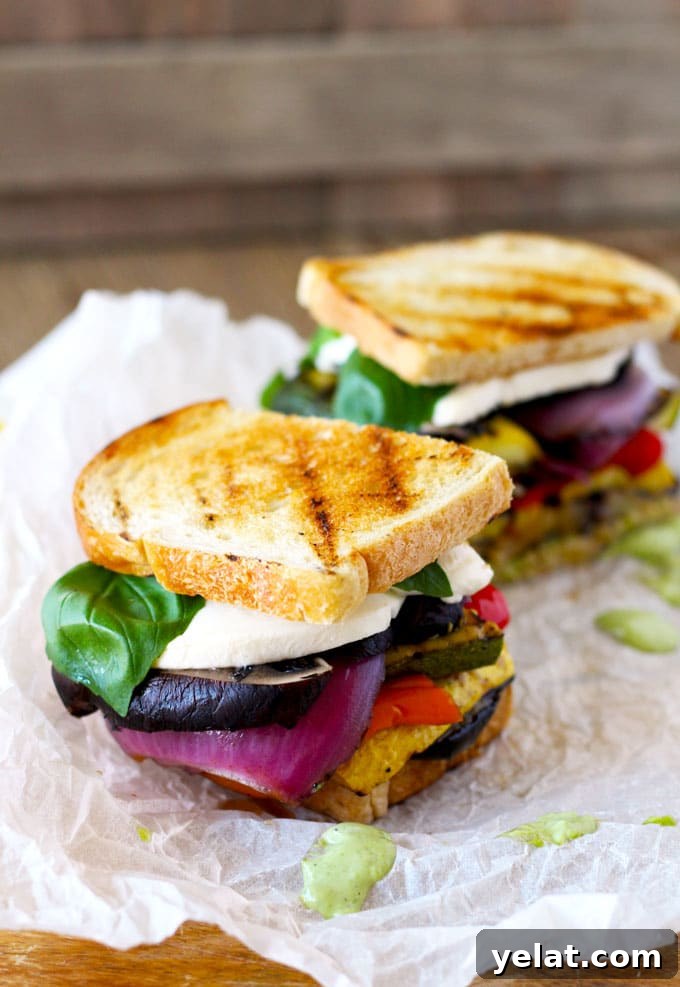 Grilled Vegetable Sandwich with Fresh Mozzarella and Basil Aioli 5 Side shot of two Grilled Veggie Sandwiches.