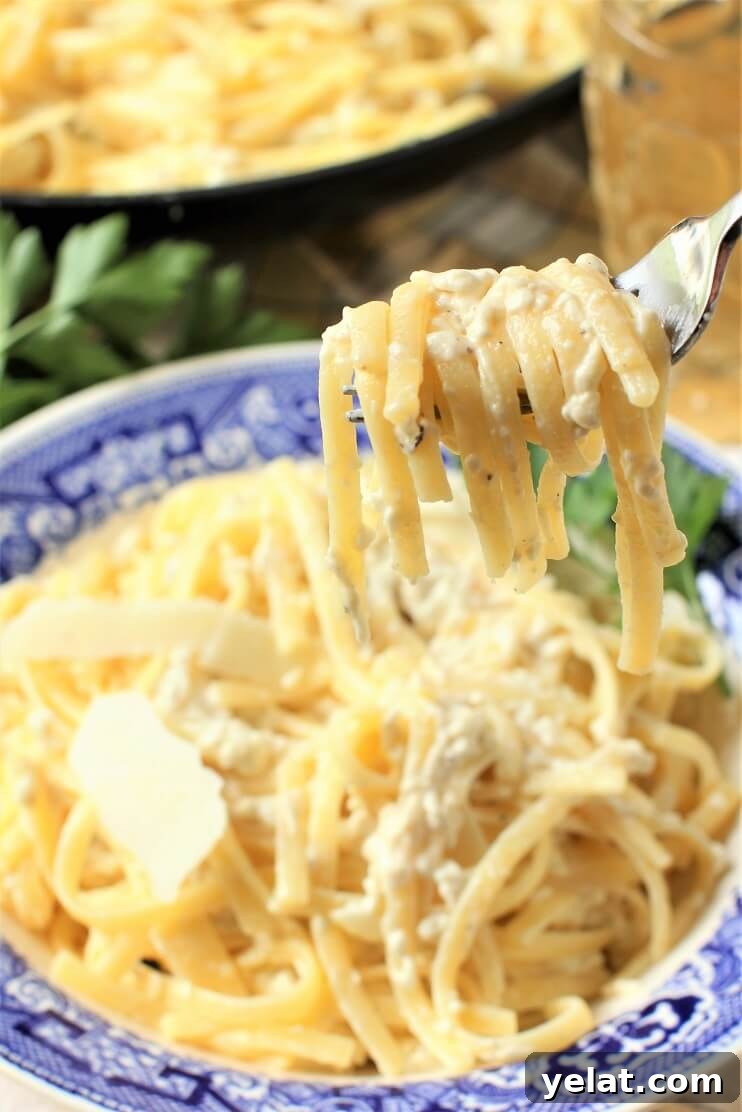 Creamy Puffball Mushroom Fettuccine Alfredo 2 a forkful of puffball fettuccine alfredo