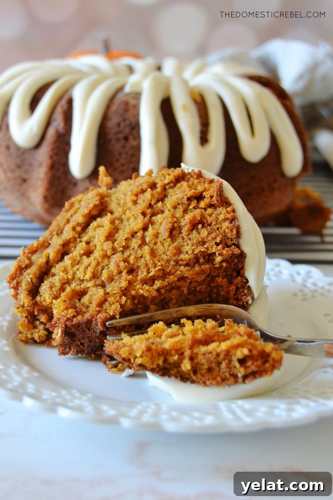 Quick Last-Minute Thanksgiving Desserts to Impress Guests 2 a piece of pumpkin bundt cake on its side with a fork taking a bite out of it
