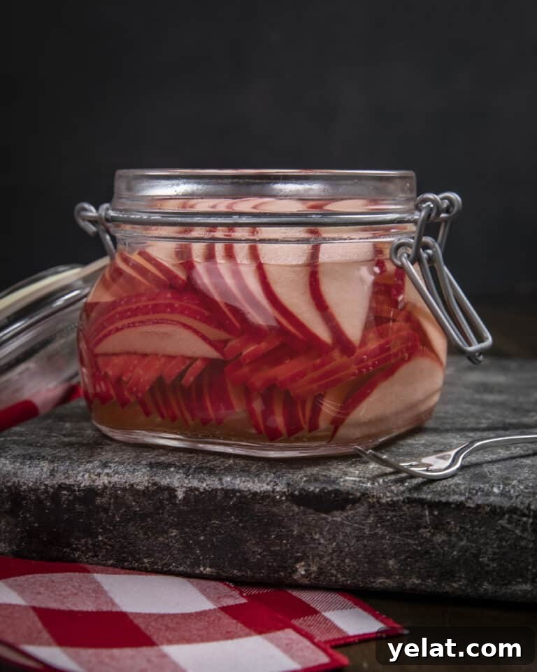 Pickled apples in jar