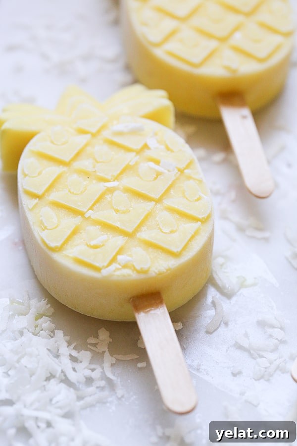 Pineapple popsicle in the shape of a pineapple.