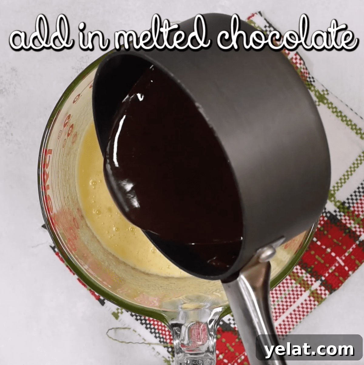Chewy Chocolate Crinkle Cookies Recipe for Perfectly Soft Centers 5 adding melted chocolate to cookie dough