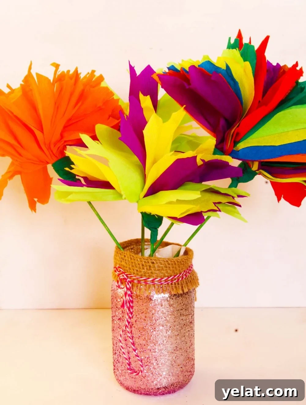 Budget-Friendly DIY Crepe Paper Flower Tutorials 2 Easy tissue paper flowers made with crepe paper in various colors