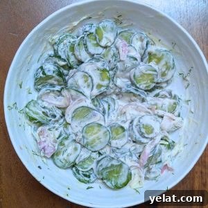 Creamy cucumber salad in a bowl