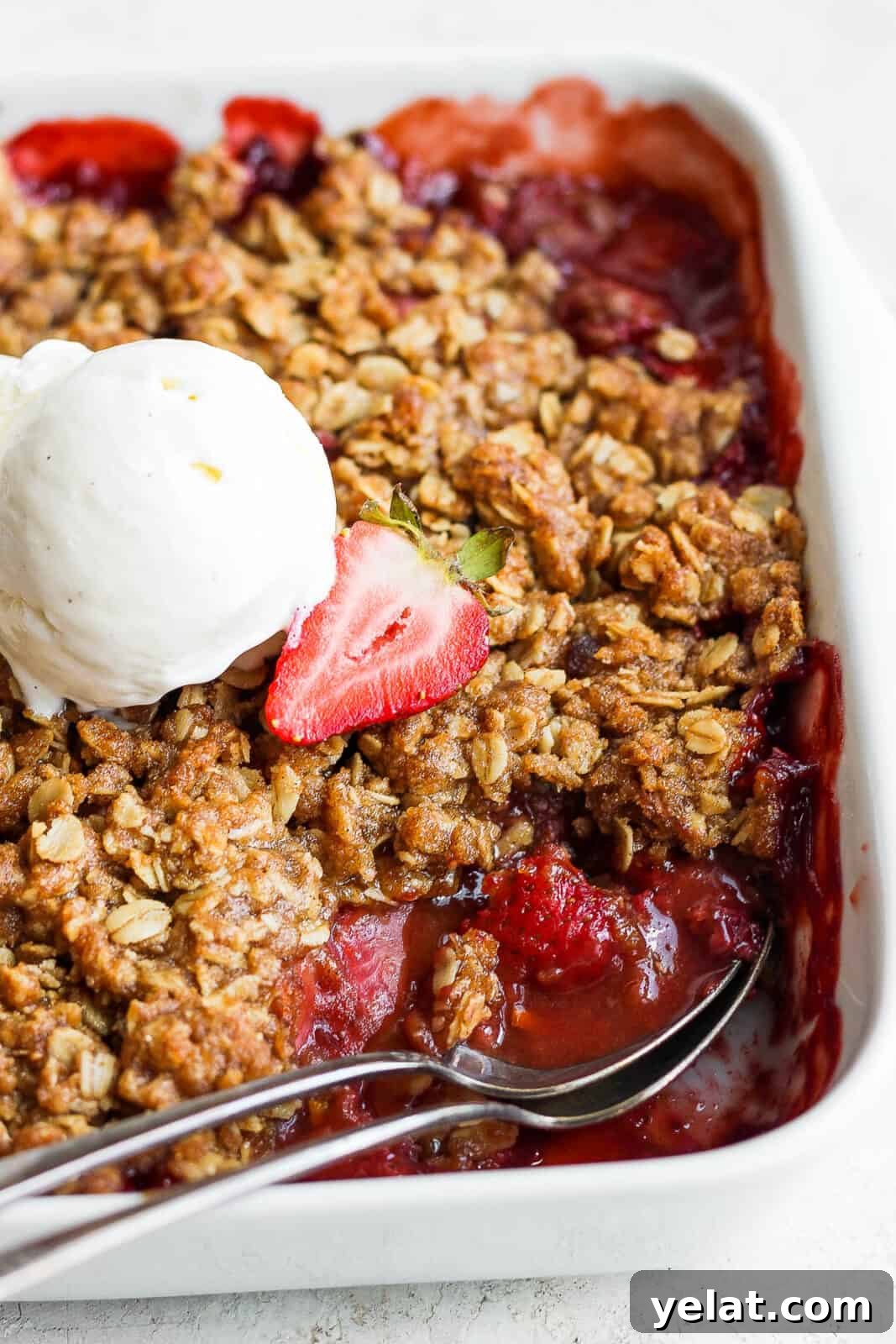 An easy strawberry crisp with vanilla ice cream!