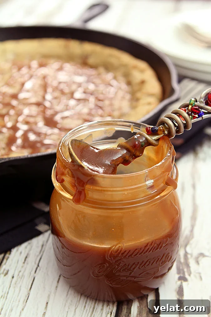 Chocolate Chip Skillet Cookie with Pecans & Bourbon Caramel Sauce Chocolate Chip Skillet Cookie with Pecans & Bourbon Caramel Sauce