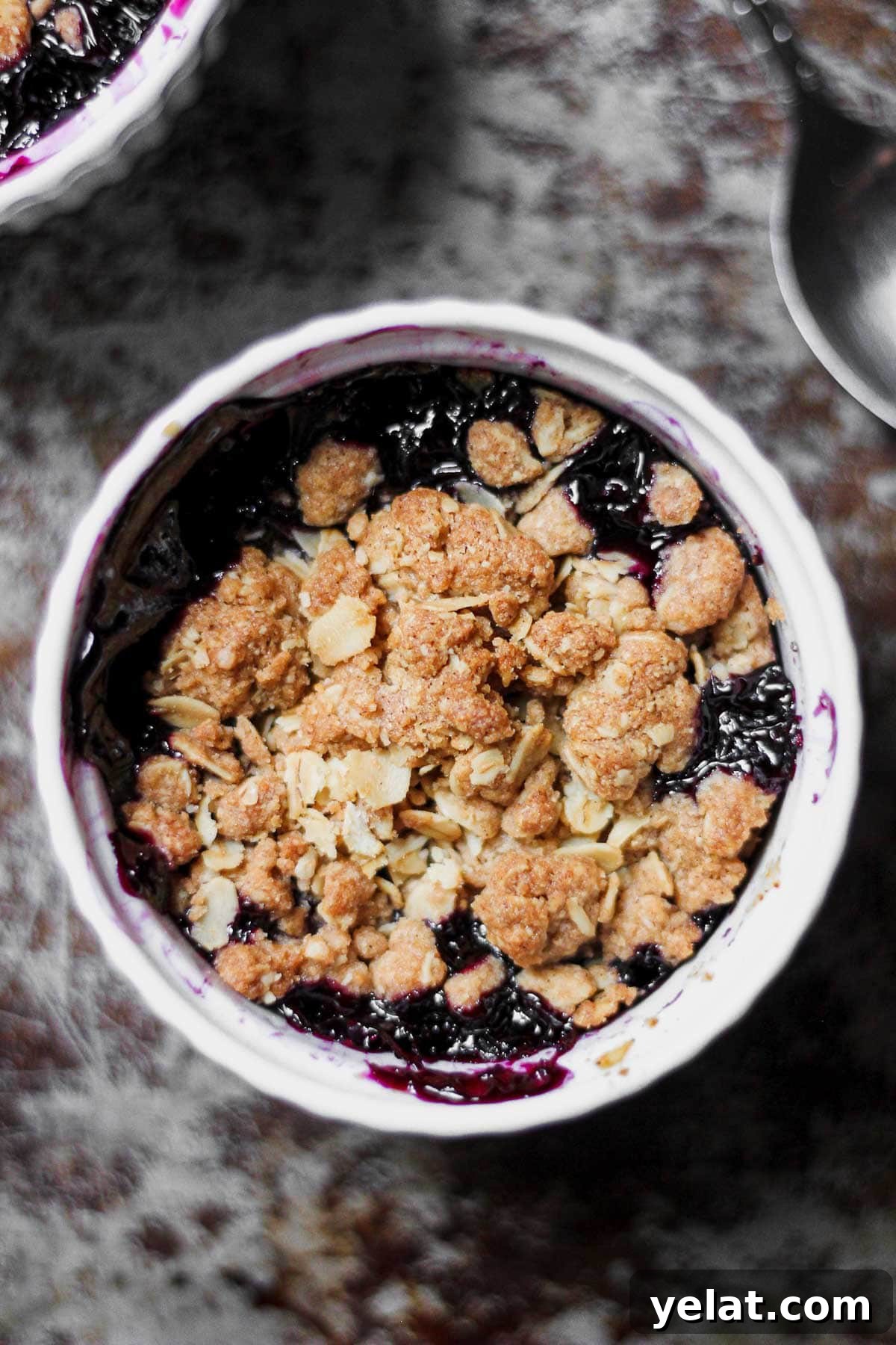 Gluten-Free Blueberry Crisp with Oat Topping 7 vegan blueberry crisp recipe in a small white ramekin for baking blog