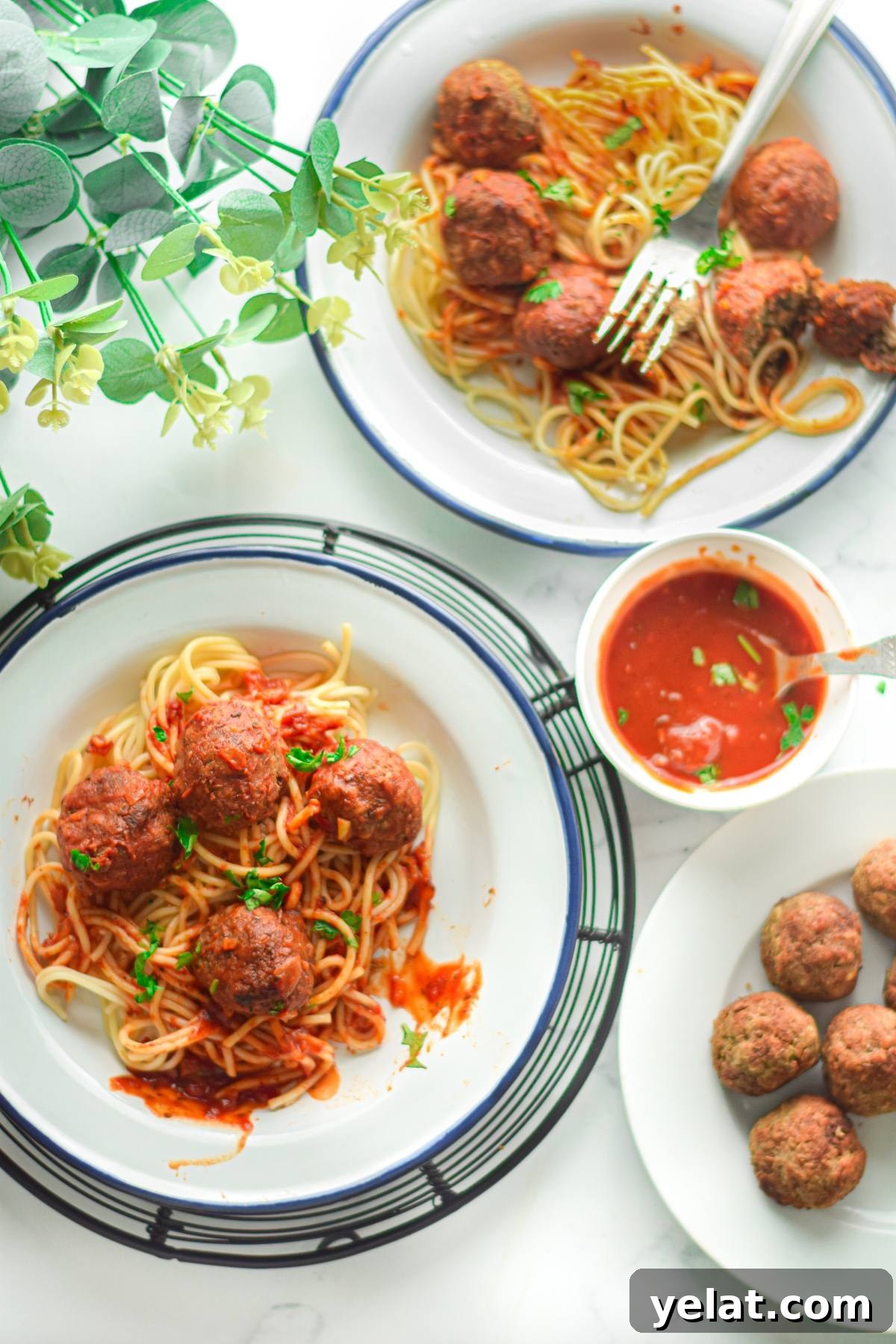 Air Fryer Meatballs in Marinara Sauce: Quick Homemade Recipe 3 Two plates of vegan meatballs with spaghetti marinara, a bowl of sauce, and a plate of plain vegan meatballs create a delicious plant-based feast.
