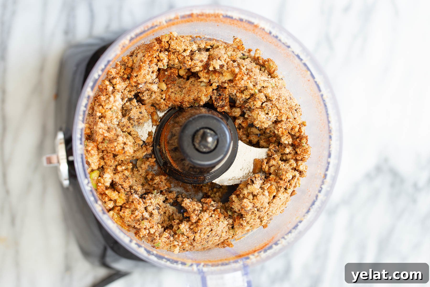 walnut taco meat overhead shot of vegan walnut taco meat in a food processor