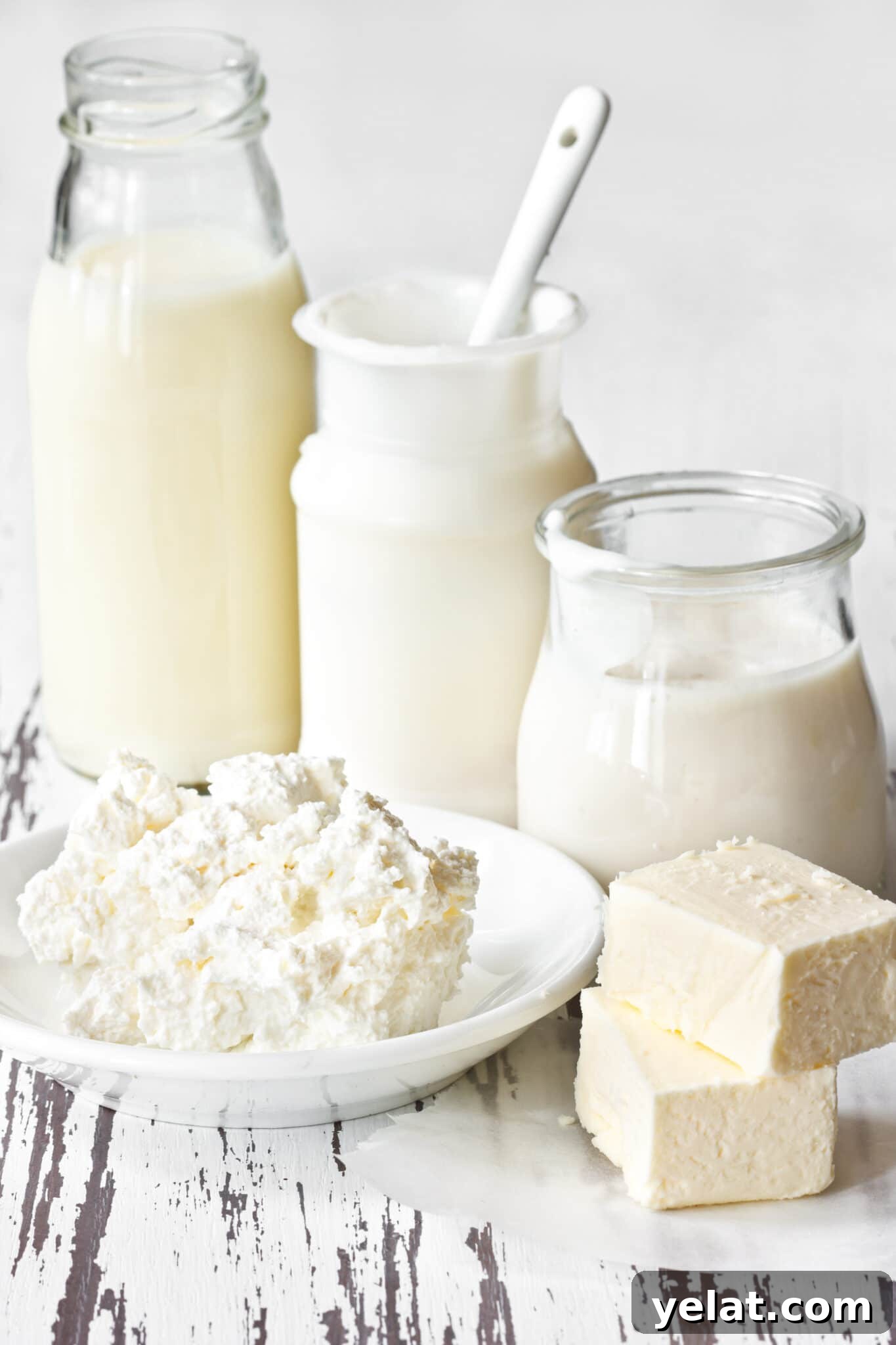 Low-Carb Pantry Essentials for Baking: Flour Substitutes & Staples 8 Fresh dairy products on an old kitchen board.