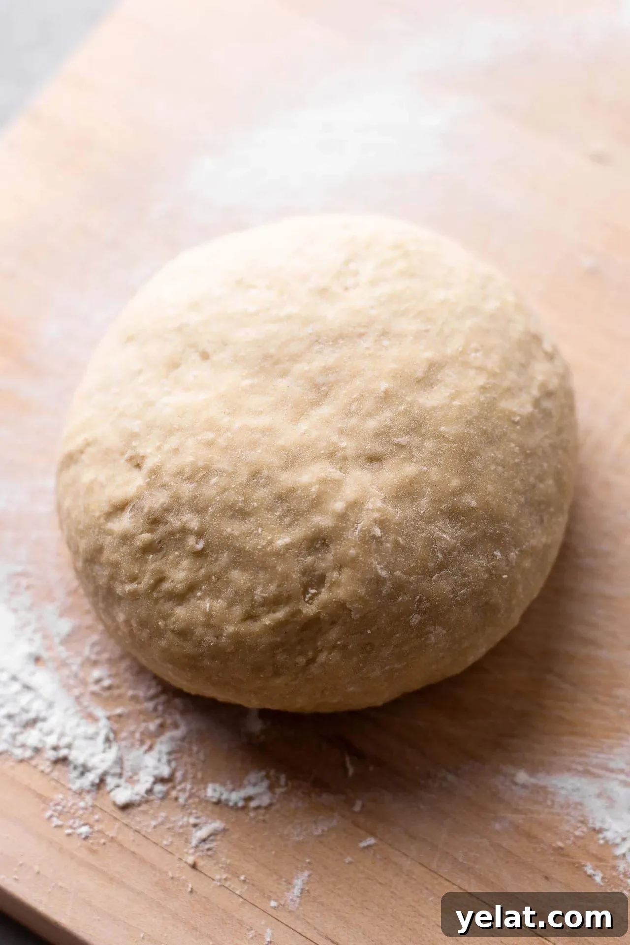 Cinnamon Rolls for Two: Small-Batch Recipe for Soft, Gooey Treats 7 small batch cinnamon rolls ball of dough on lightly floured work surface