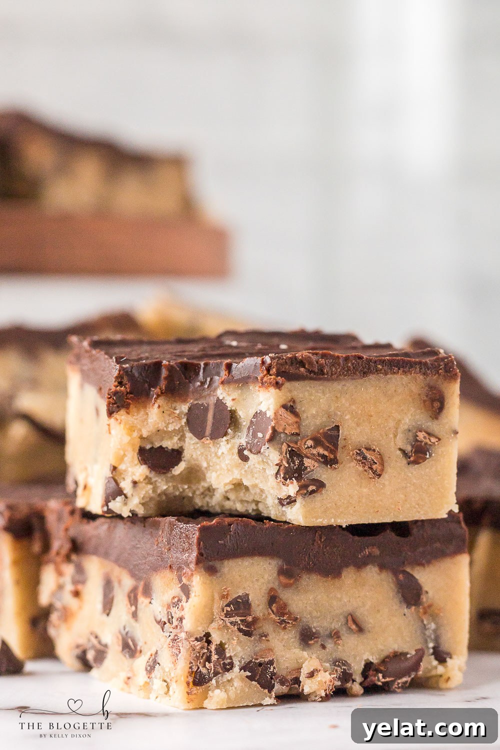 No-Bake Chocolate Chip Cookie Bars are irresistible, fun to make, and safe to eat! Simply put the bars in the refrigerator, chill, and enjoy!