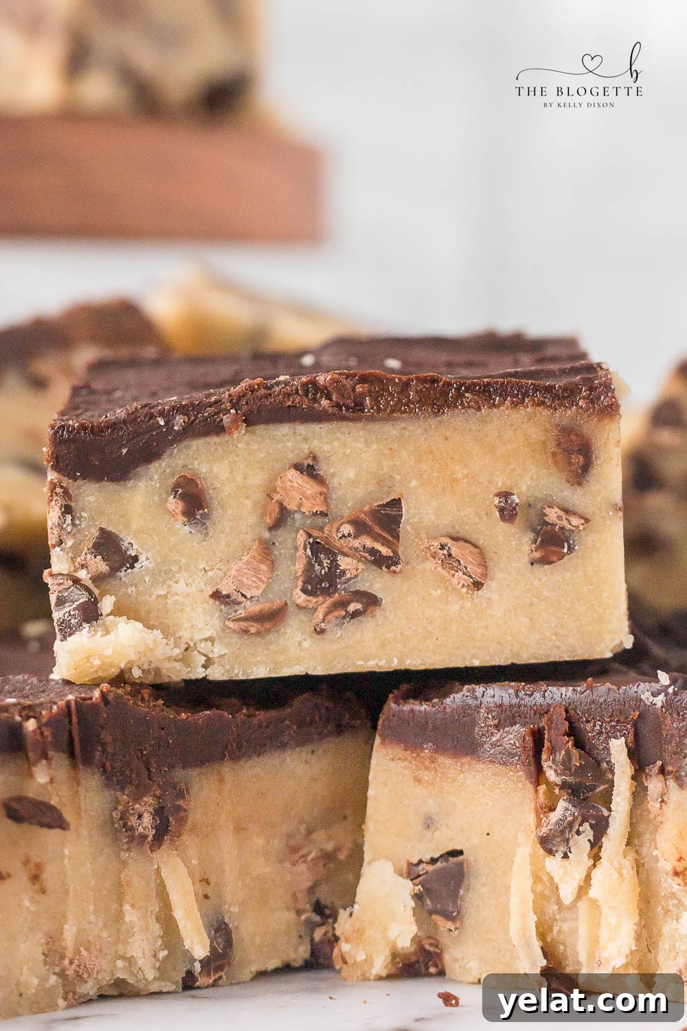 No-Bake Chocolate Chip Cookie Bars are irresistible, fun to make, and safe to eat! Simply put the bars in the refrigerator, chill, and enjoy!