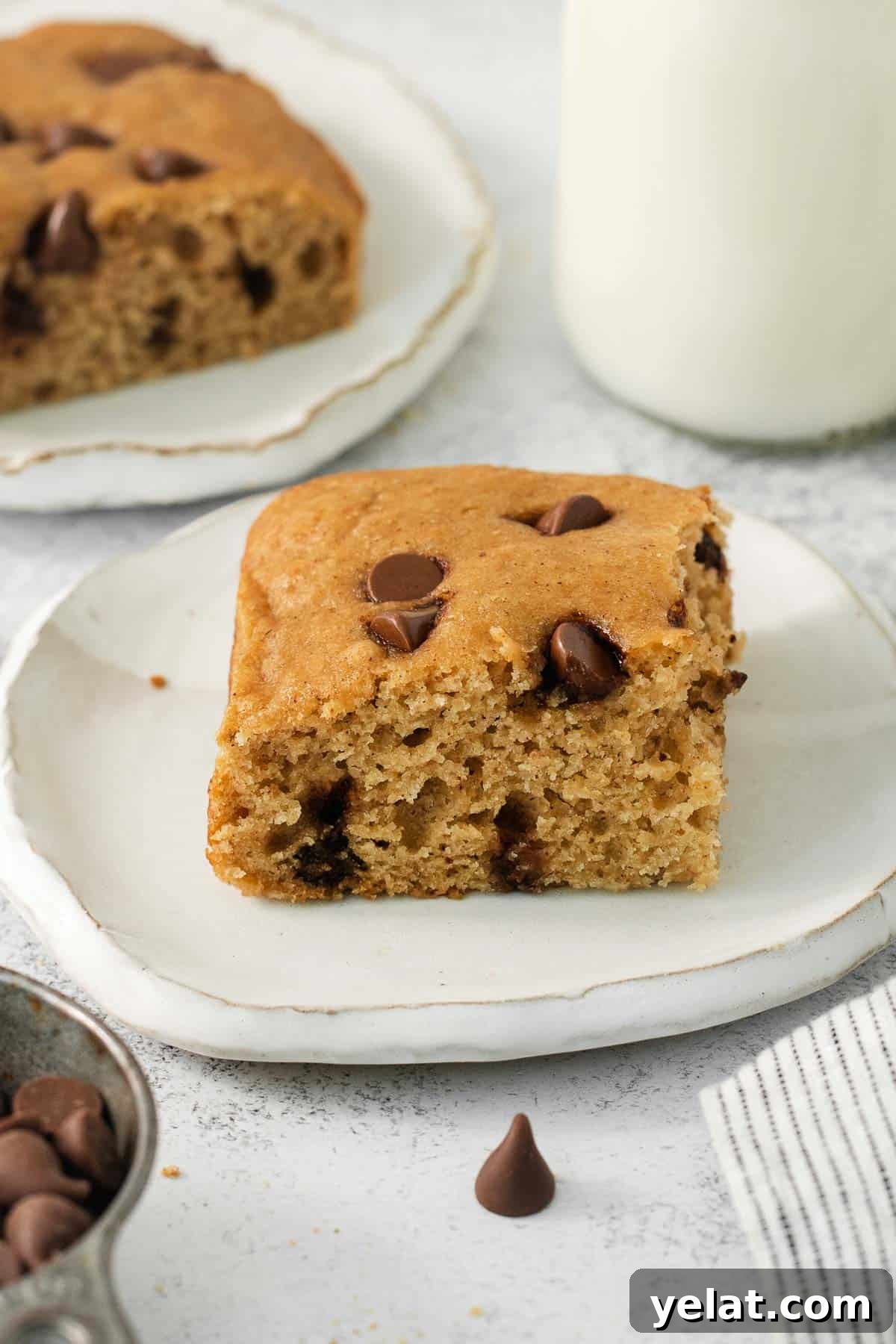 A slice of applesauce cake on a plate