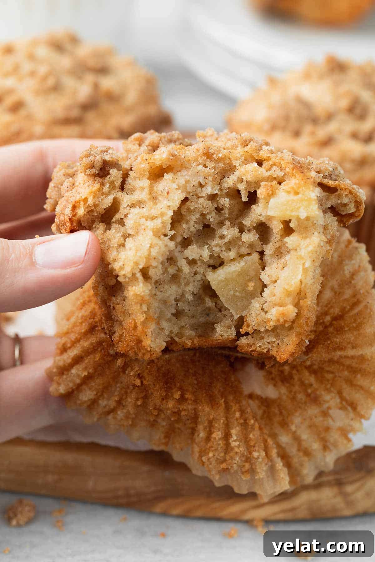 Apple muffin with a bite taken out of it