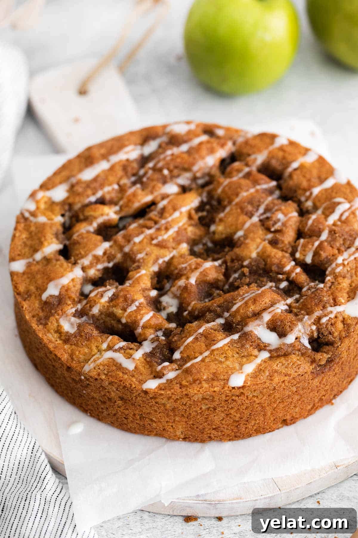 A whole apple cake on a counter top