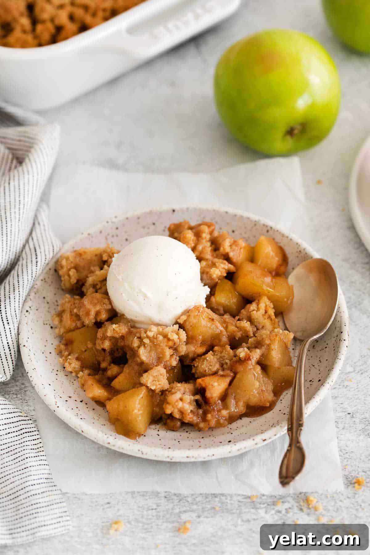 A serving of gluten-free apple crumble on a plate