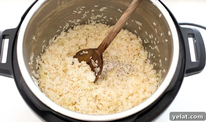 sautéing rice and onions in pressure cooker