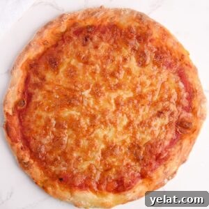 Low calorie pizza crust topped with low fat mozzarella cheese and tomato sauce