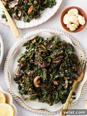 kale and mushrooms on a pretty plate