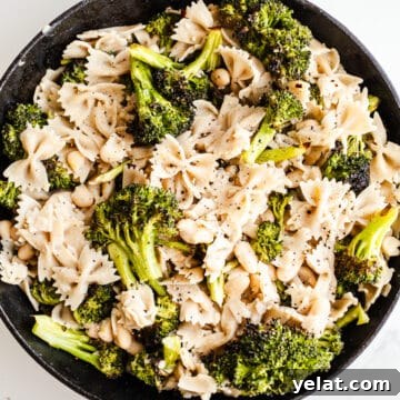 Creamy White Bean Pasta with Garlic and Herbs 12 Pasta and broccoli in a skillet.