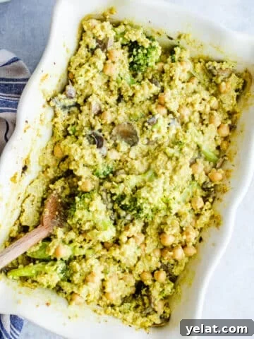 A quinoa and vegetable bake in a casserole dish.