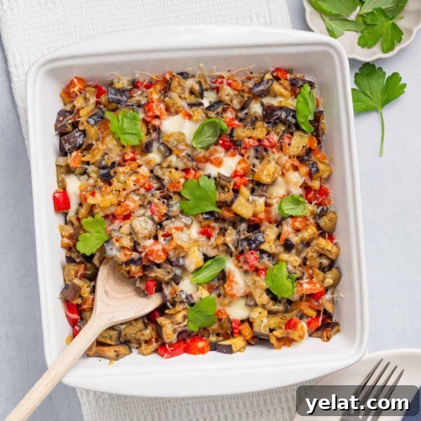 An overhead image of eggplant casserole in a baking dish.