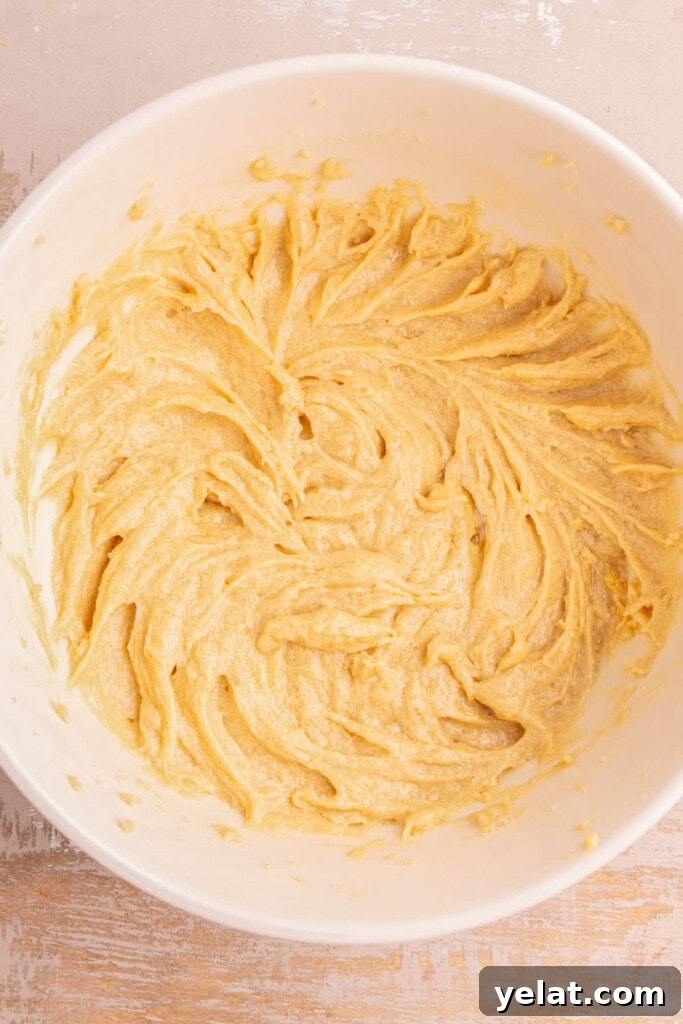 Creamed butter and sugar mixed with vanilla extract and egg.
