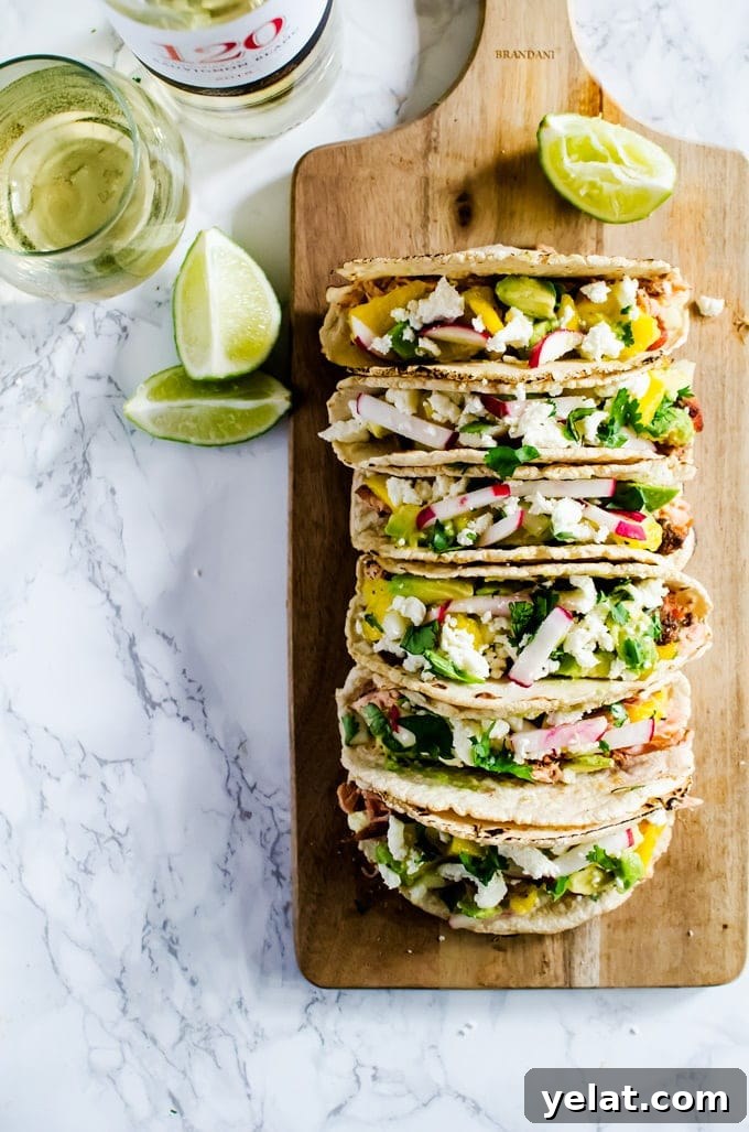 Grilled Salmon Tacos with Avocado Mango Salsa Recipe 3 Get your summer on with these grilled salmon tacos with mango avocado salsa