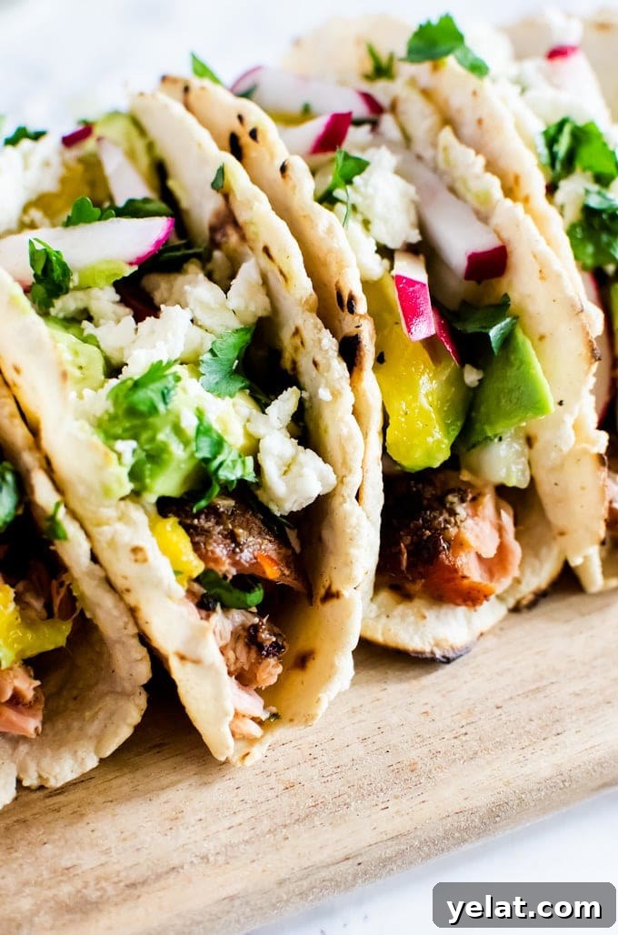 Grilled Salmon Tacos with Avocado Mango Salsa Recipe 5 Flaky grilled salmon tacos with a refreshing mango avocado salsa. The perfect summer BBQ recipe