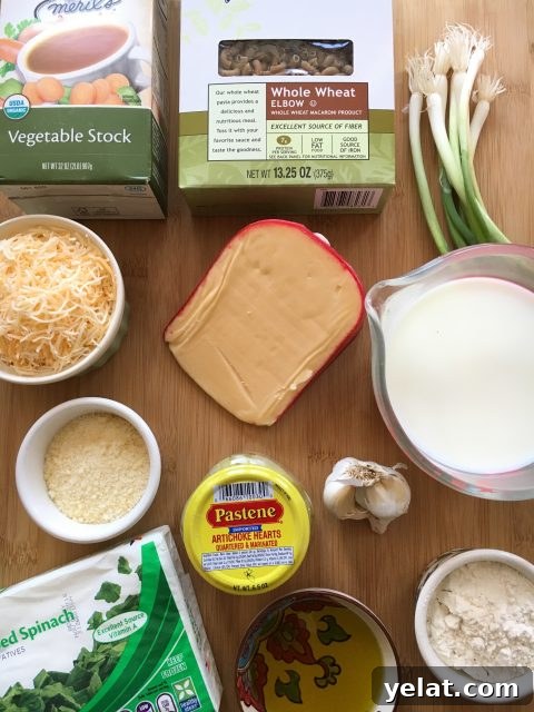 Spinach and Artichoke Macaroni and Cheese Recipe 4 Spinach, Artichoke Mac & Cheese via lizshealthytable.com #dinner #pasta #wholegrain #spinach
