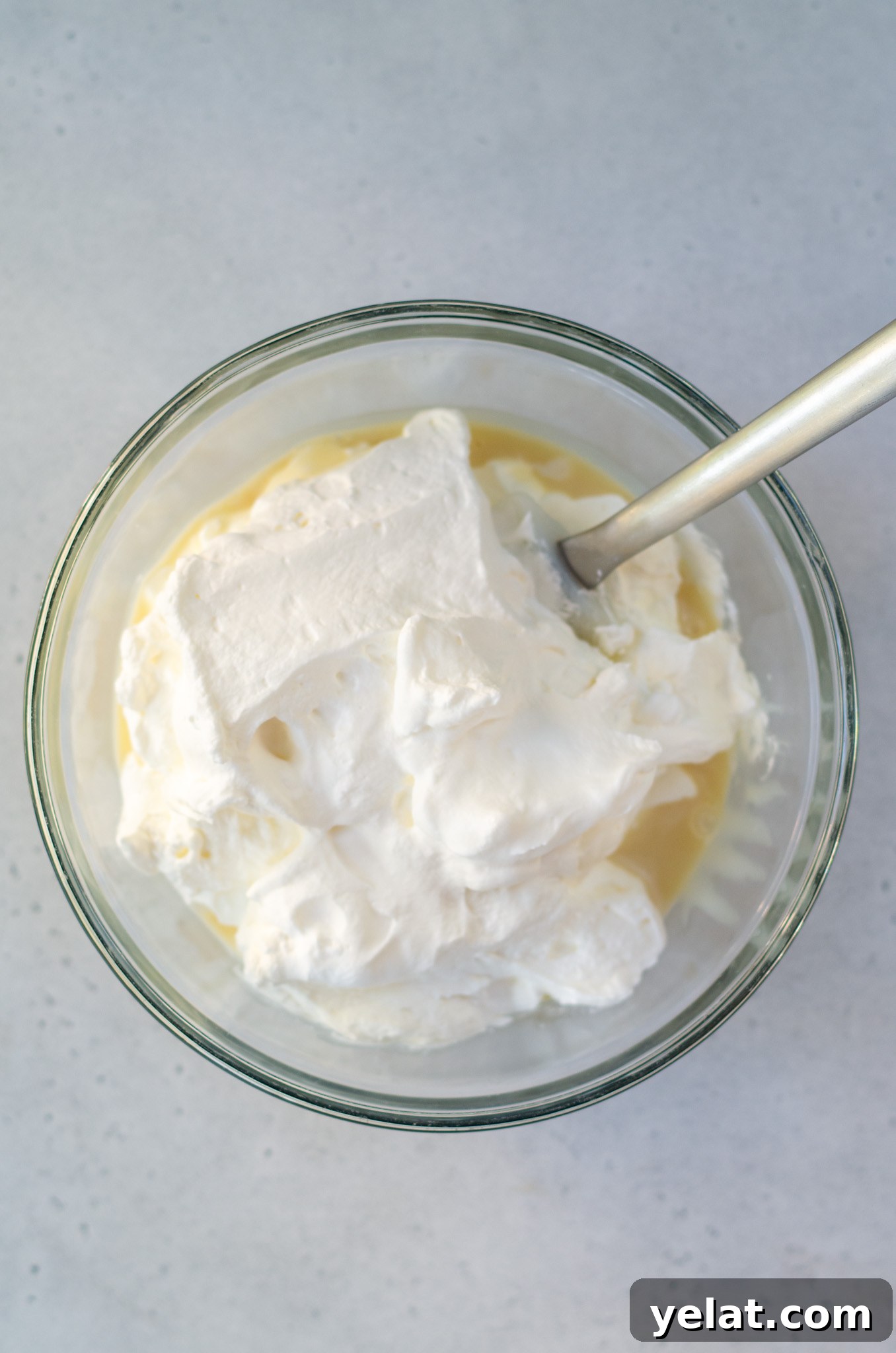 Homemade Cherry Cordial Ice Cream Recipe -> Cherry Cordial Ice Cream Recipe You Can Make at Home 9 sweetened condensed milk and whipped cream in a bowl