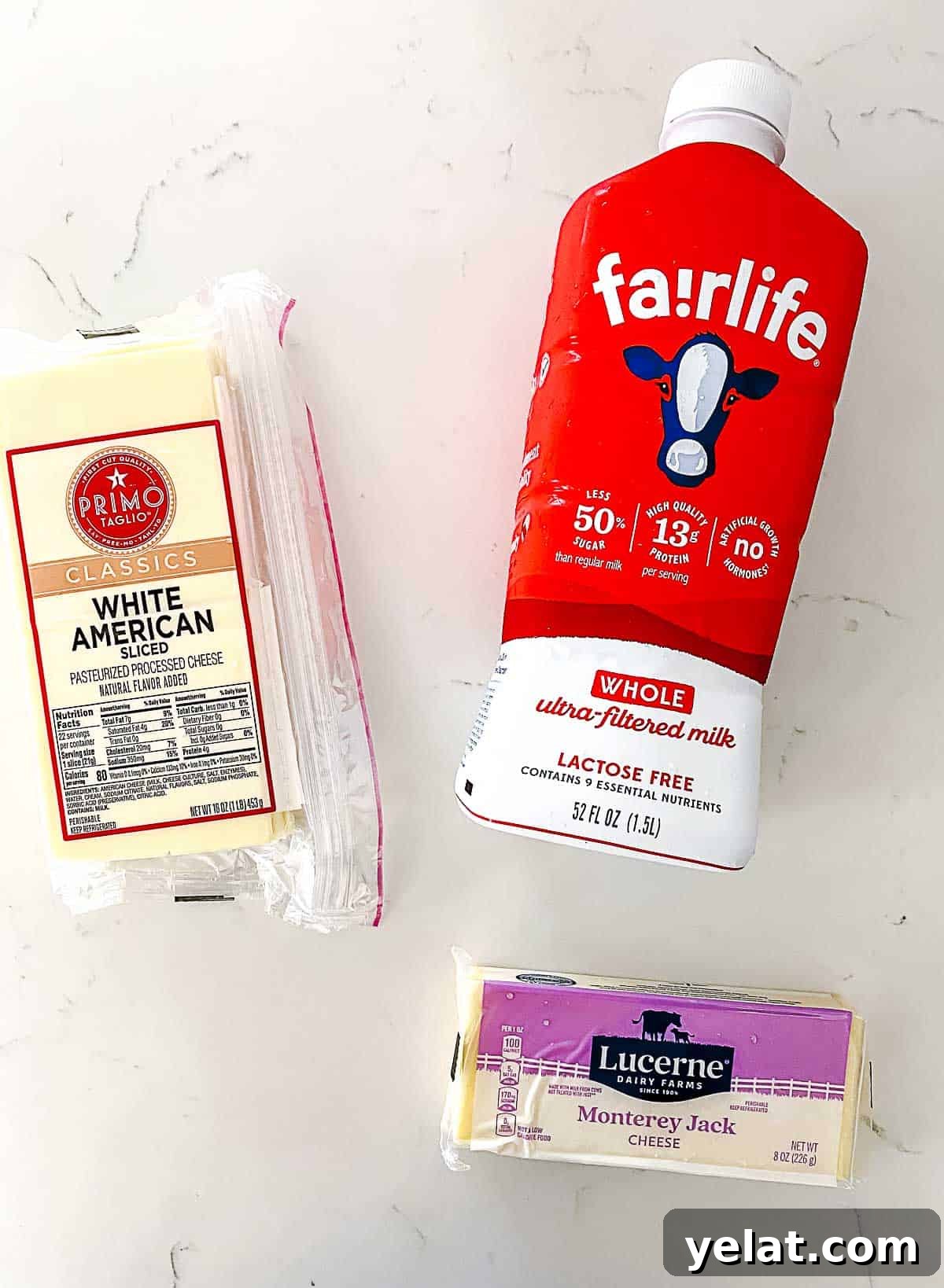 Ingredients on table for white cheese sauce.