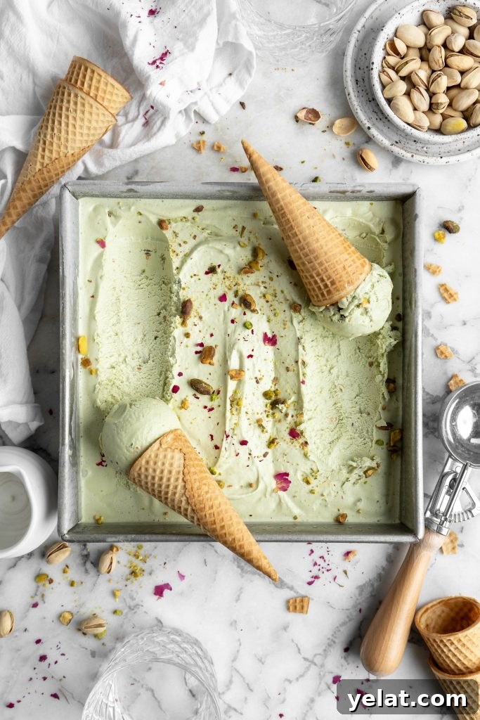 Homemade Pistachio Ice Cream Recipe with Creamy Texture 3 pistachio ice cream in a baking pan with cones