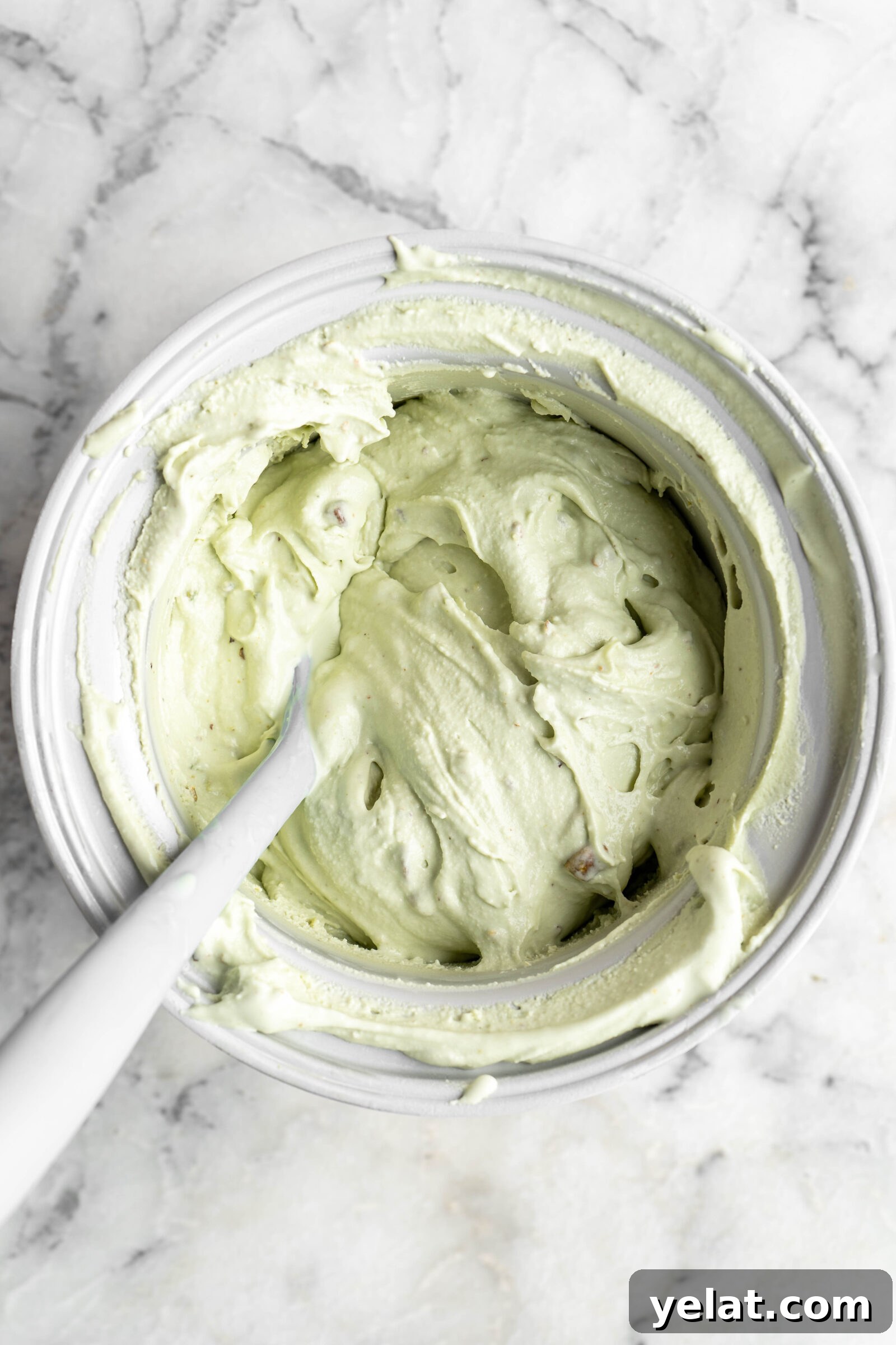 Homemade Pistachio Ice Cream Recipe with Creamy Texture 6 churned pistachio ice cream in ice cream maker