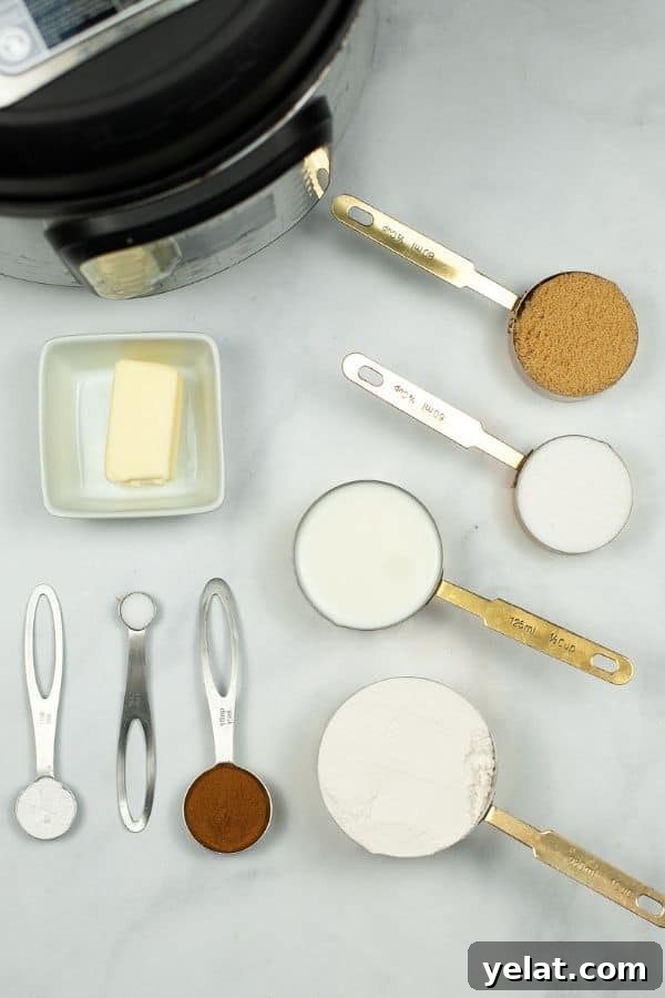 Measuring cups and spoons with flour, sugars, butter and ingredients to make churro bites