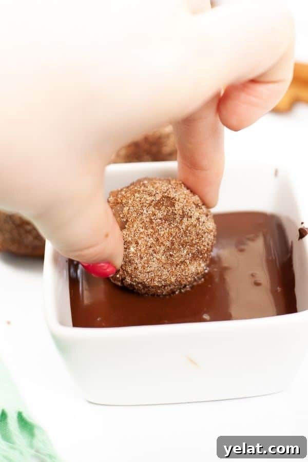Churro dipped in chocolate