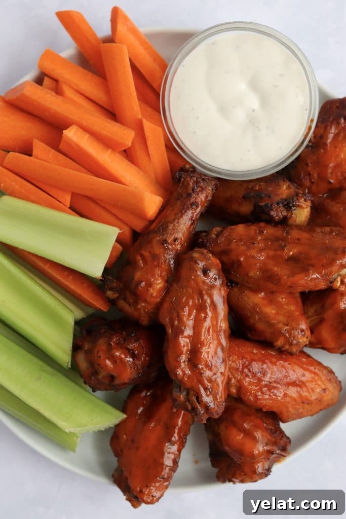 20 Delicious Things to Make in Your Air Fryer Tonight 6 Air Fryer buffalo chicken wings with carrots and celery and ranch