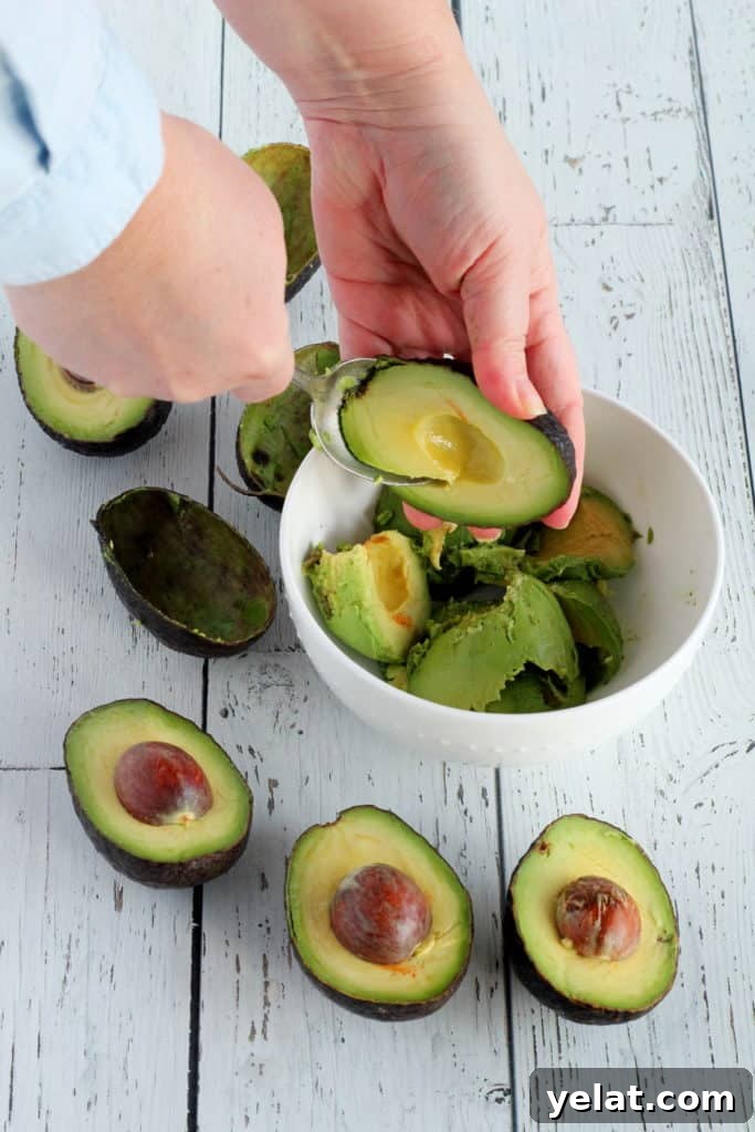 Guacamole Recipe You'll Love: Creamy, Zesty, Guaranteed 6 remove avocado flesh from skin
