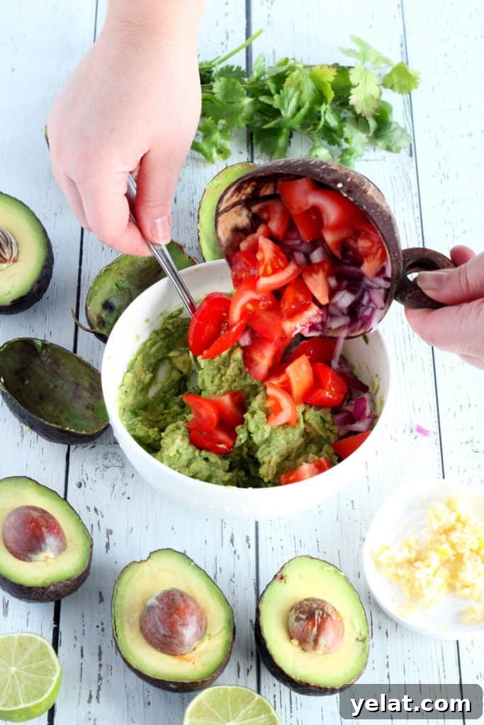 Guacamole Recipe You'll Love: Creamy, Zesty, Guaranteed 7 add cherry tomatoes and purple onion