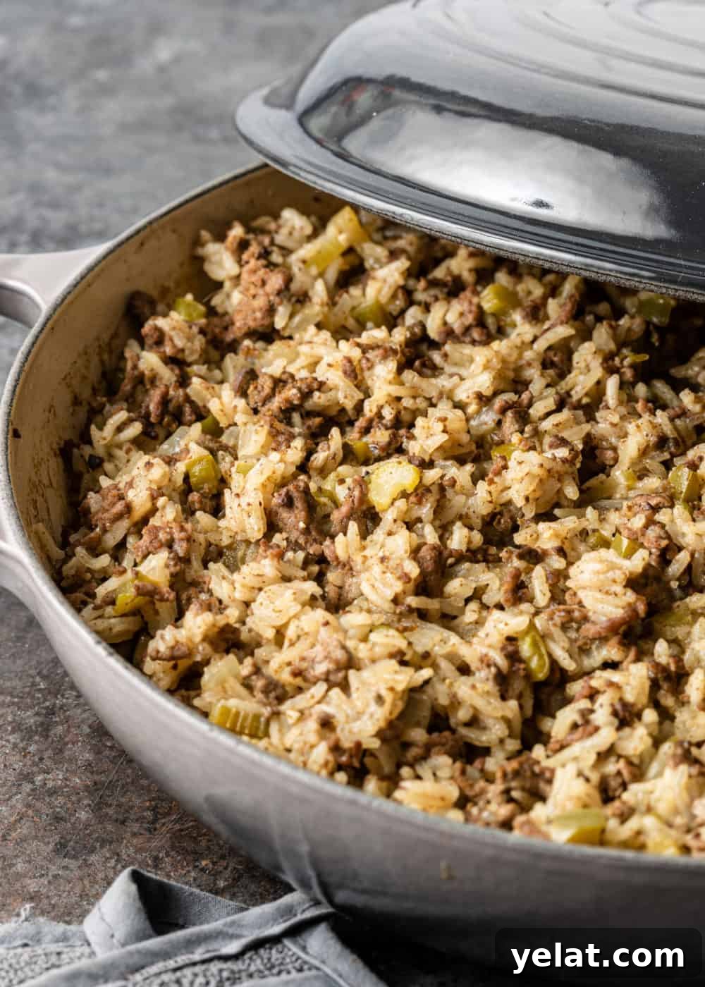 Authentic Cajun Dirty Rice Recipe: Flavorful One-Pot Meal 3 basmati rice, ground beef, celery, onion, and spicy seasonings combined and cooked in saute pan