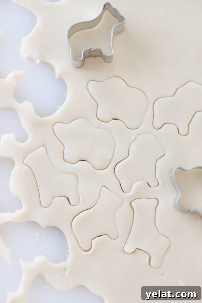 Homemade Circus Animal Cookies Recipe for Crunchy Iced Treats 9 rolled dough cut out with cookie cutters