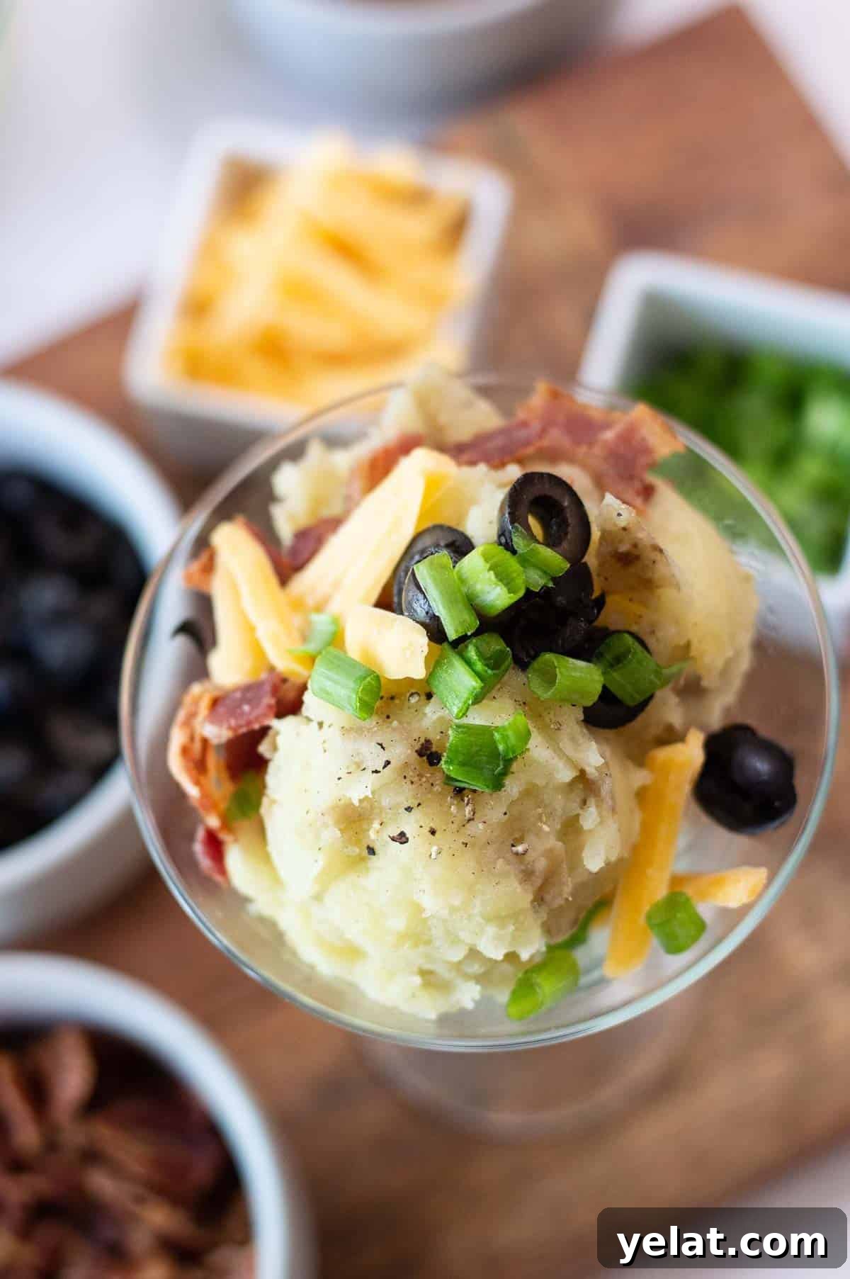 Loaded Mashed Potato Bar Ideas with Toppings and Mashtini Recipes 3 mashed potatoes in a martini glass with toppings