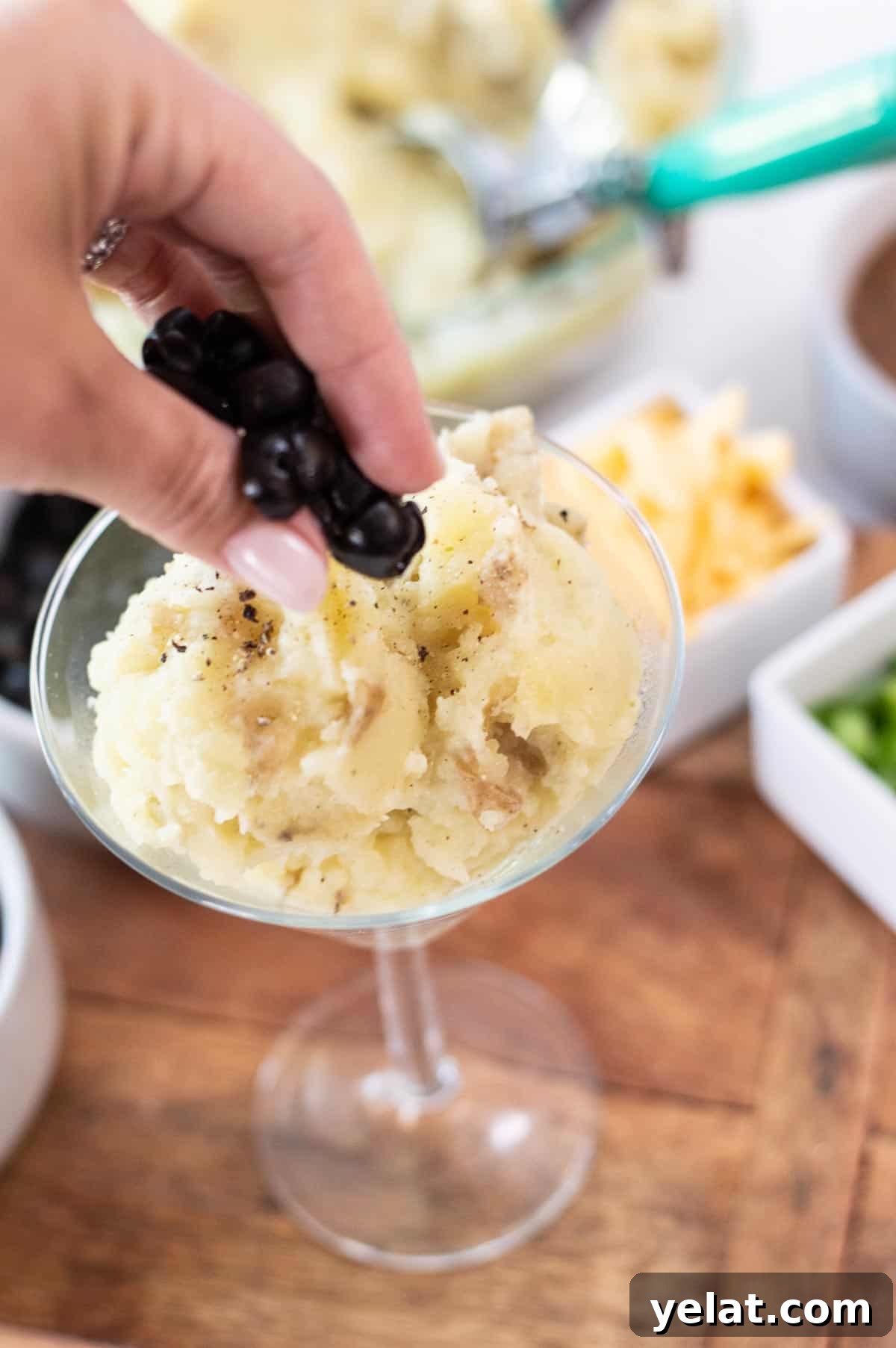 Loaded Mashed Potato Bar Ideas with Toppings and Mashtini Recipes 6 mashed potatoes in a martini glass with olives