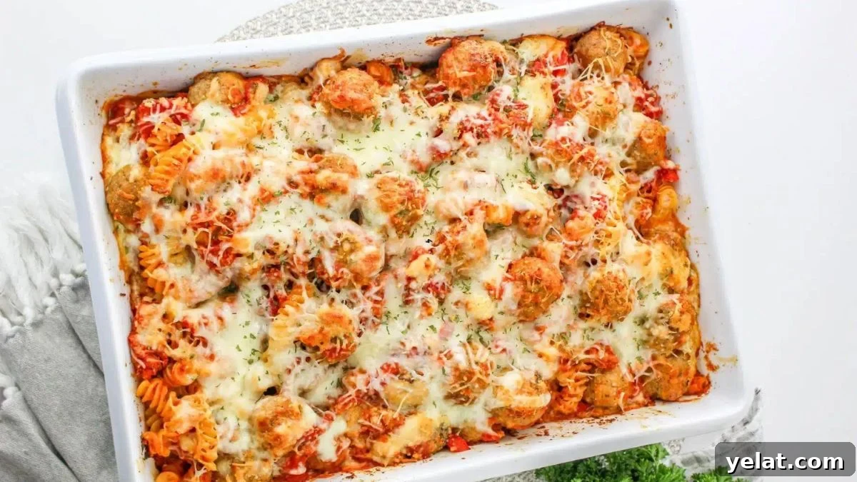 Dump and bake meatball casserole in a white baking dish.