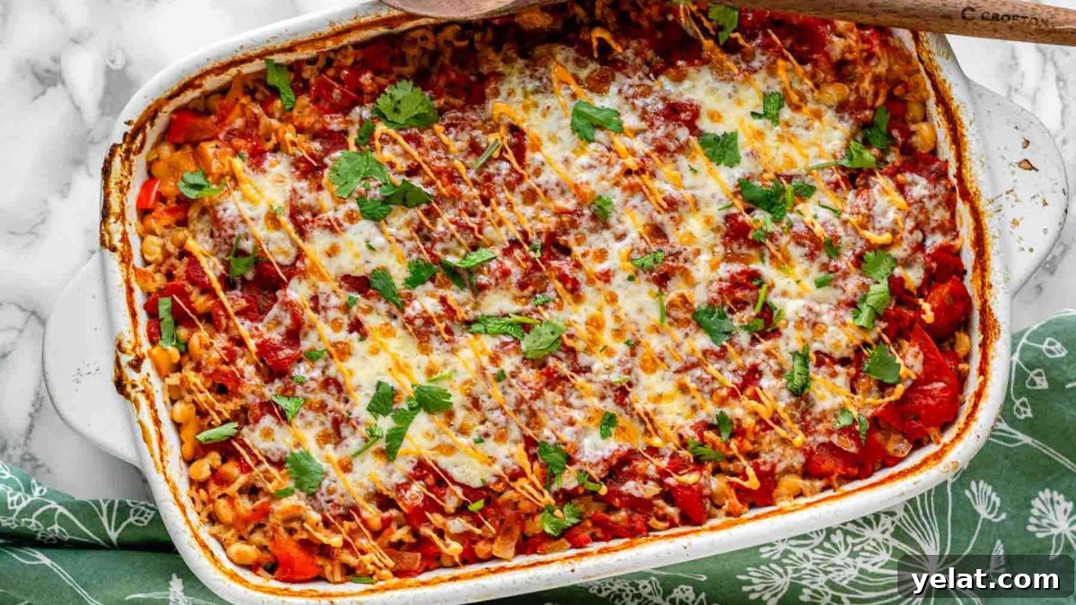 Stuffed pepper casserole in a white baking dish.