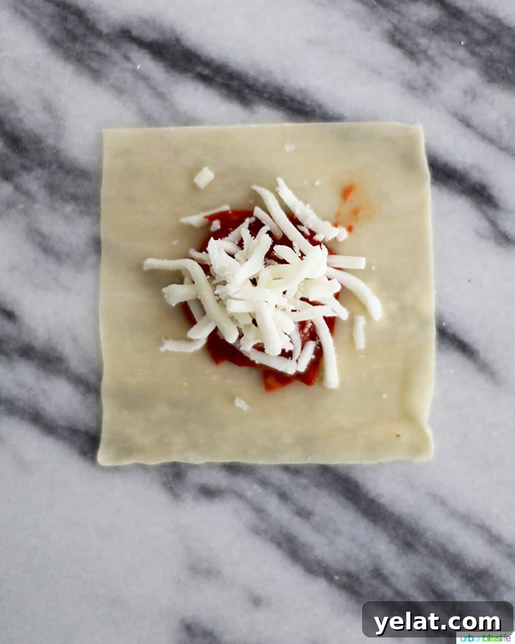 assembling air fryer pizza rolls