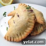 Blueberry Lemon Basil Hand Pies — An easy recipe for a unique and totally portable dessert. Perfect for summer picnics!